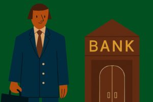 Mortgage broker with suitcase standing outside a bank.