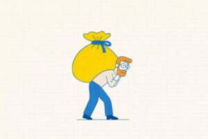 Man carrying a heavy sack.